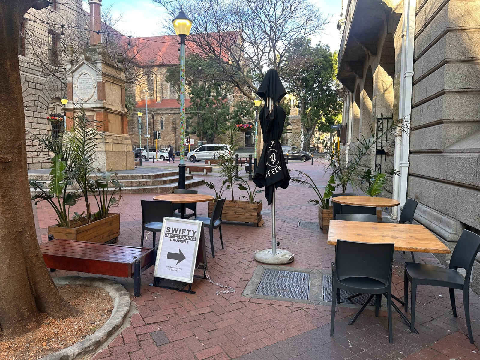 Outdoor café seating overlooking the Cape Town street